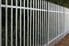 galvanized steel fencing made of a long row of vertical bars