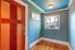Room with crown molding and window molding
