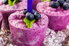 purple homemade popsicles with blueberries