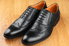 A pair of men's leather shoes in good condition.