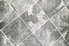 grey and white tile-look vinyl flooring