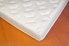 A mattress with polyurethane foam.