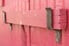 close-up of reddish pink wooden ledge-and-brace door