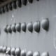 Several rows of solid rivets used to fasten a metal girder.