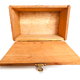 an open, empty wooden box from the top