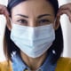 woman wearing surgical face mask