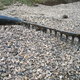 rake moving loose gravel