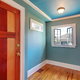 Room with crown molding and window molding