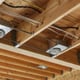 recessed lighting fixtures in ceiling under construction