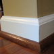 wall with white baseboard molding