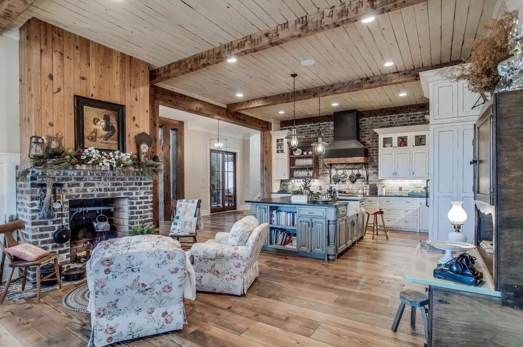 Country-style kitchen and fireside sitting area inside Miley Cyrus' Nashville ranch.