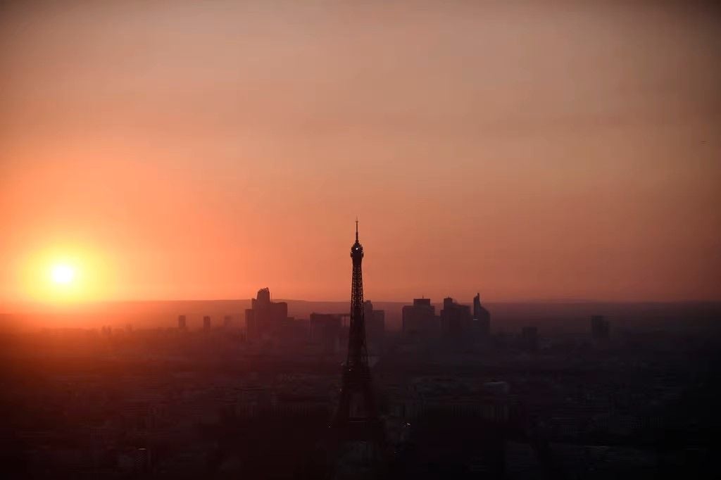 Sunset view of the Eiffel Tower. 