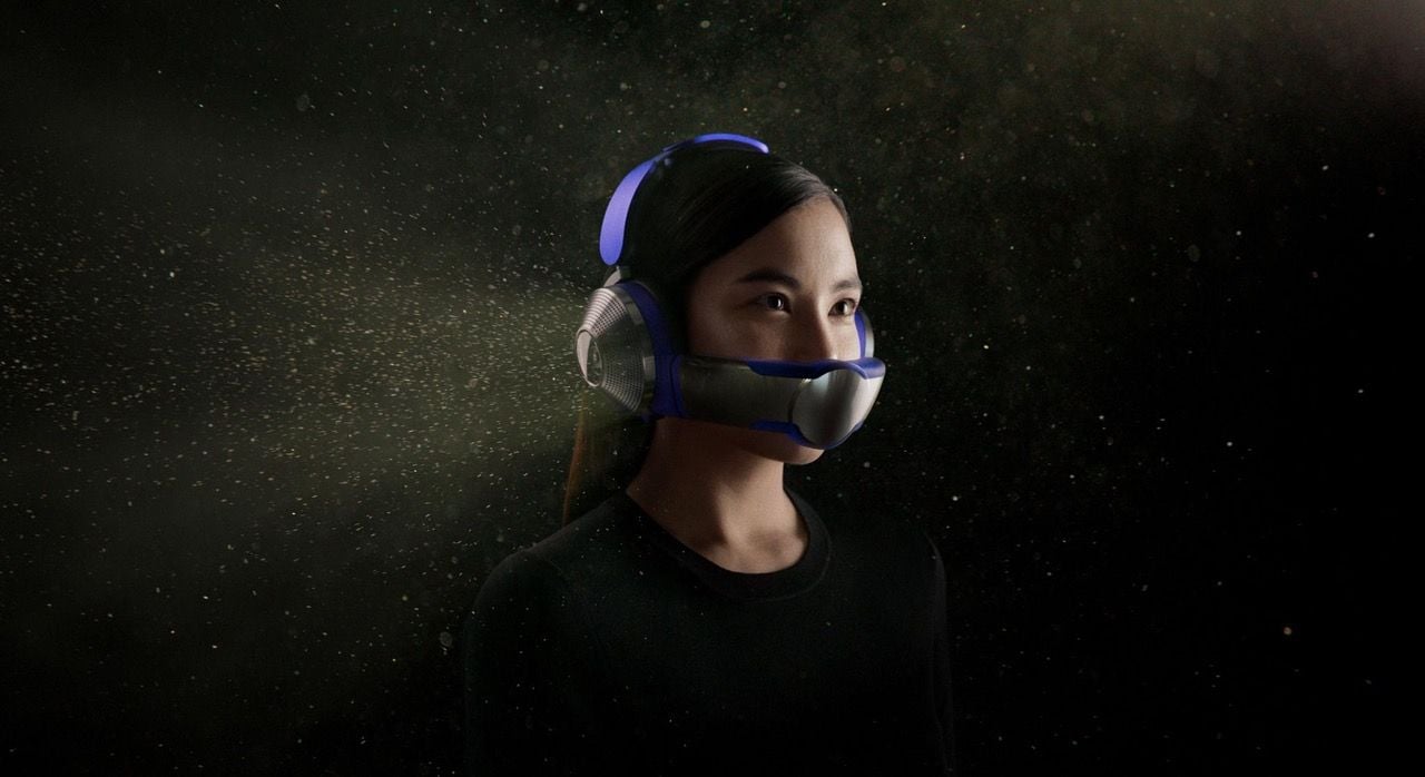 Young woman wears Dyson Zone Air Purifying Headphones.