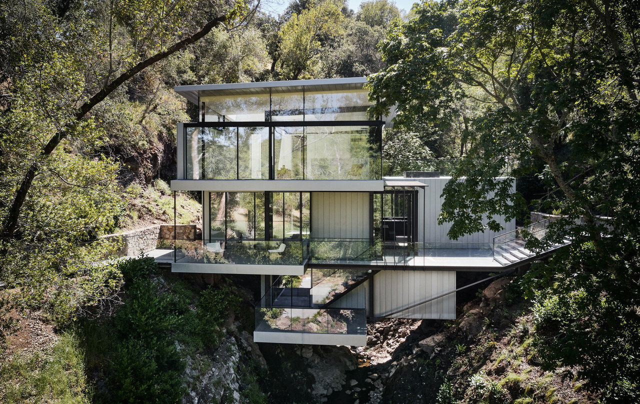 Modernist Suspension House Spans a Creek Between Two California Hillsides