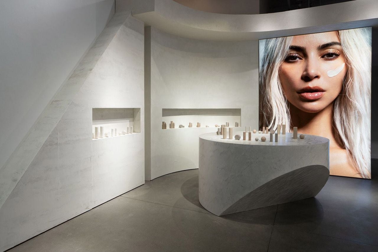 Concrete slabs and walls give the SKKN pop-up store a minimalist look similar to that of Kardashian's own home.