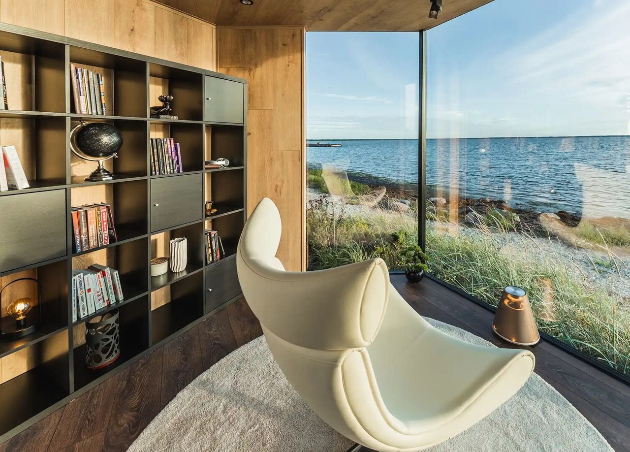 Gorgeous views of the water from the cozy interior of the Muuw backyard work pod. 