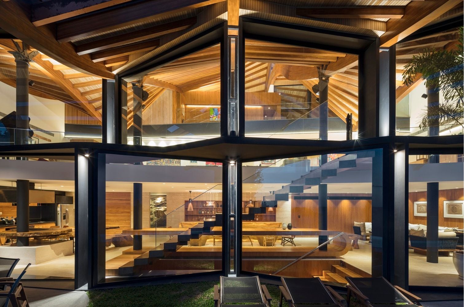 A look inside the sculptural Wave House through it's many large operable glass panels