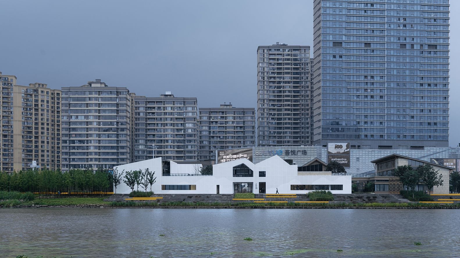 Zoomed-out view of the Duoyun bookstore alongside the region's Yongning river.