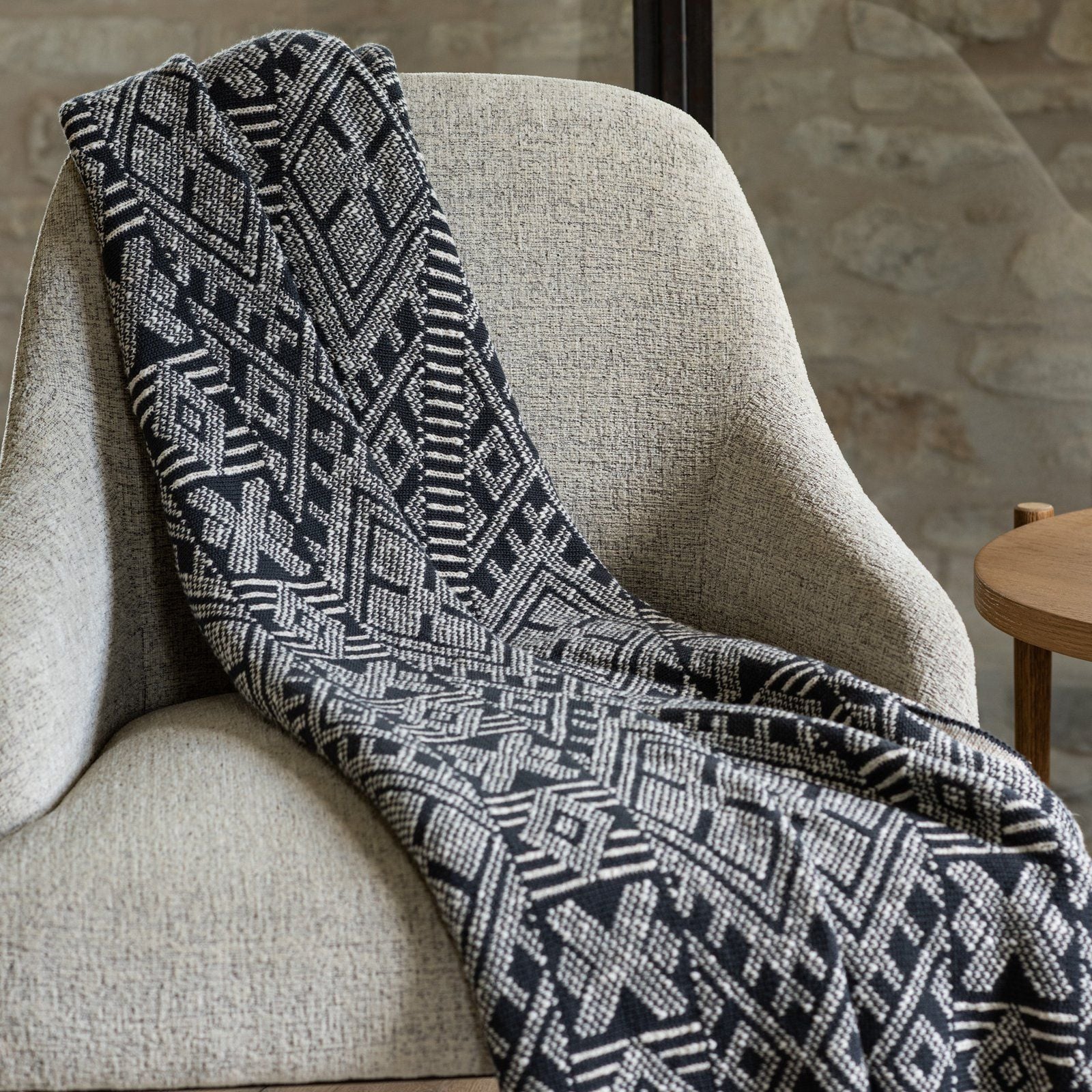 The cozy, geometric Everly Throw featured in Magnolia's new fall furniture collection. 