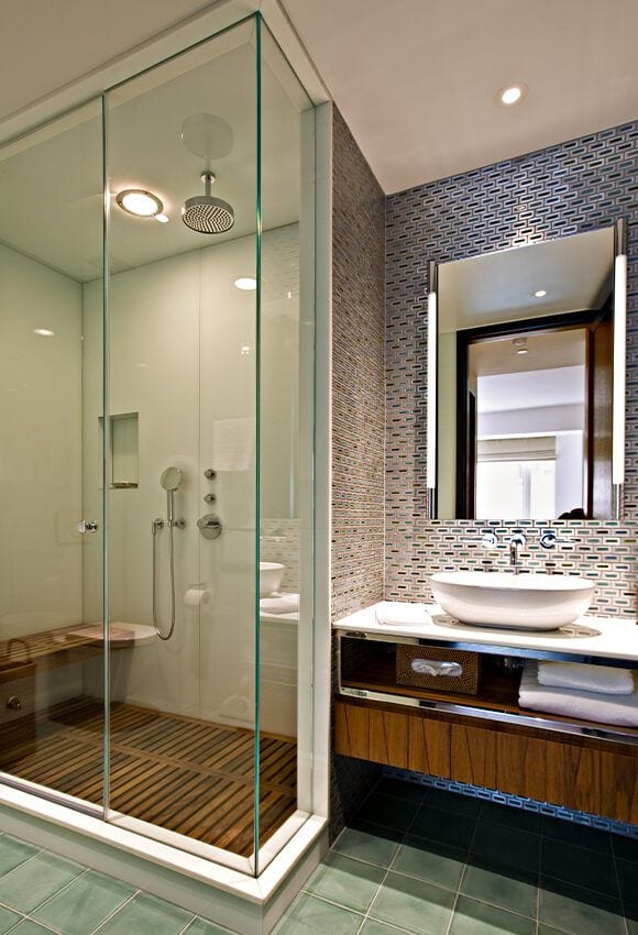 Lavish modern shower inside the Jeffrey Beers-renovated apartment at 15 Central Park West.