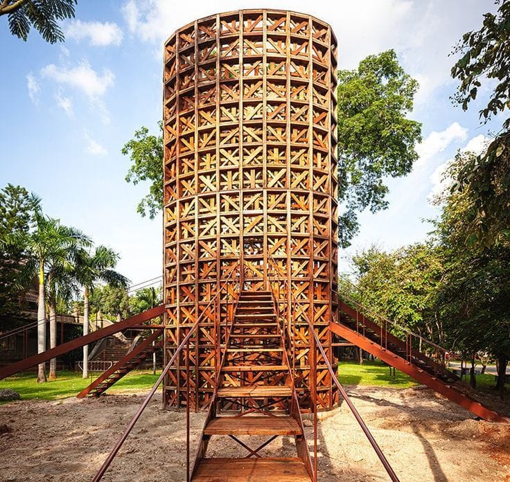 Close look at a new Boonserm Premthada-designed rice tower in Thailand made from repurposed barns.