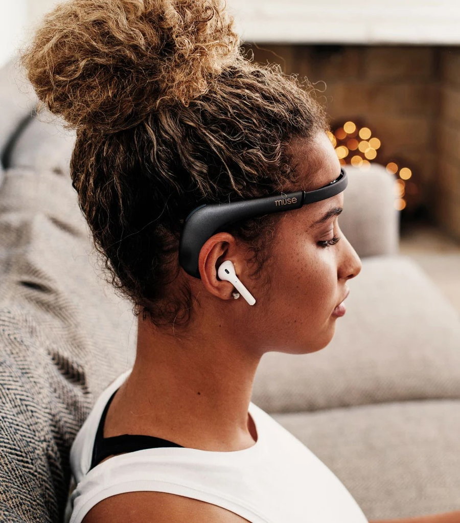 Woman enjoys a guided meditation through her MUSE 2 brain sensing headband.