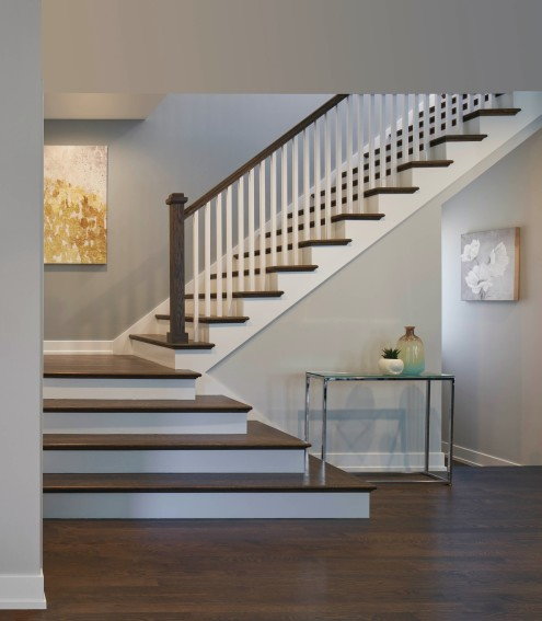 Simple stairway inside Chicago's passive HPZS-renovated Yannell PHUIS+ House.