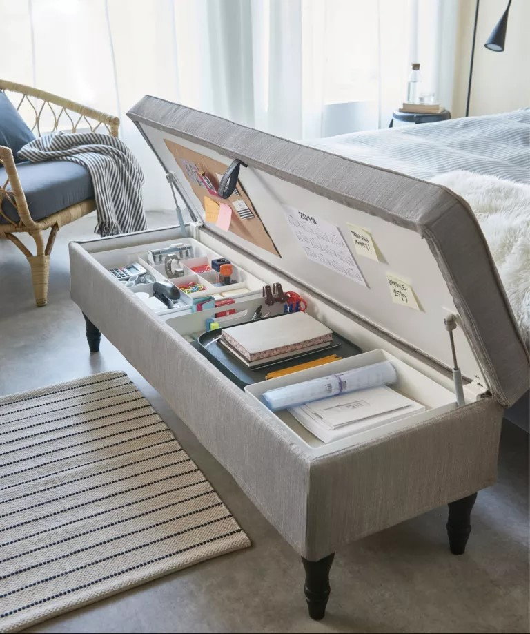 This comfy ottoman does double-duty as a clever home workspace.