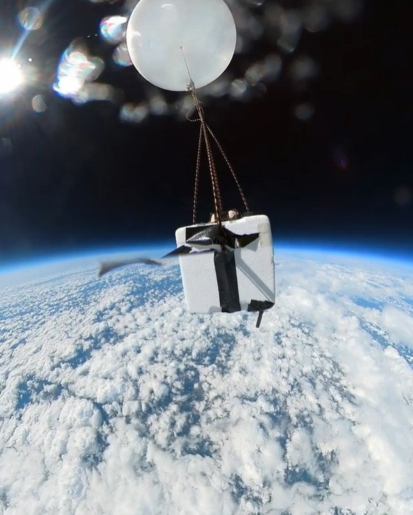Weather balloon camera made by students of St. Birdget's Church of England Primary School floats high above the Earth at the edge of space.