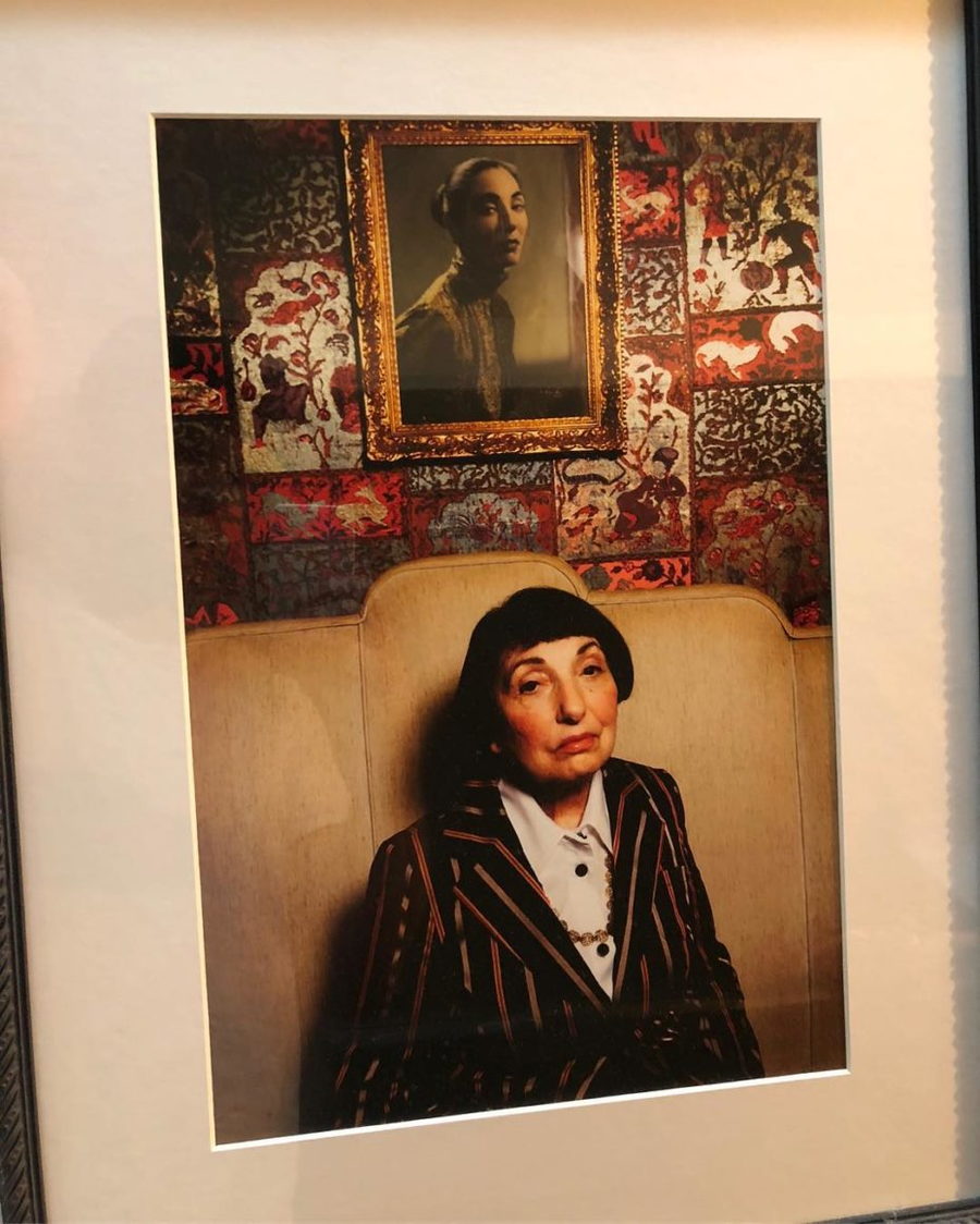Turk's Inn owner Marge Gogian sits beneath a portrait of herself at the original Turk's Inn supper club.