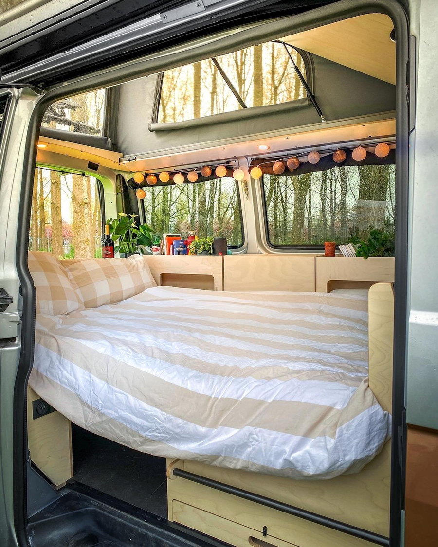 When it's time to go to sleep, the bed takes centerstage inside the Ventje campervan. 