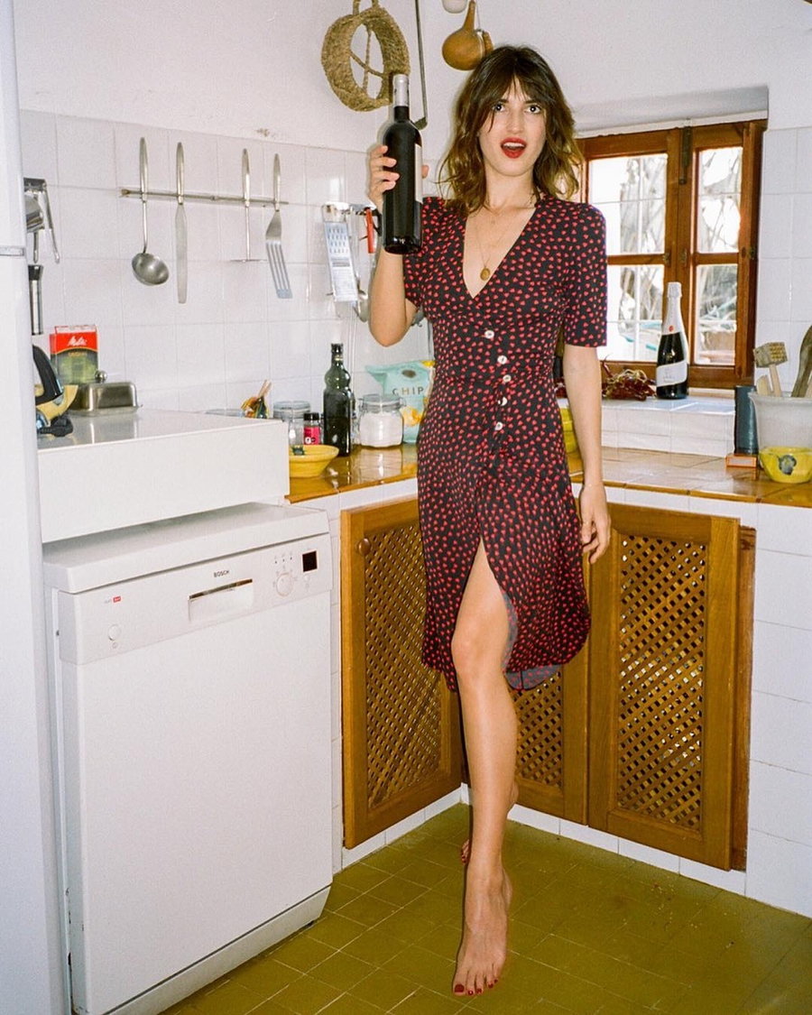 Influencer Jeanne Damas strikes a pose in her French Girl Style Kitchen