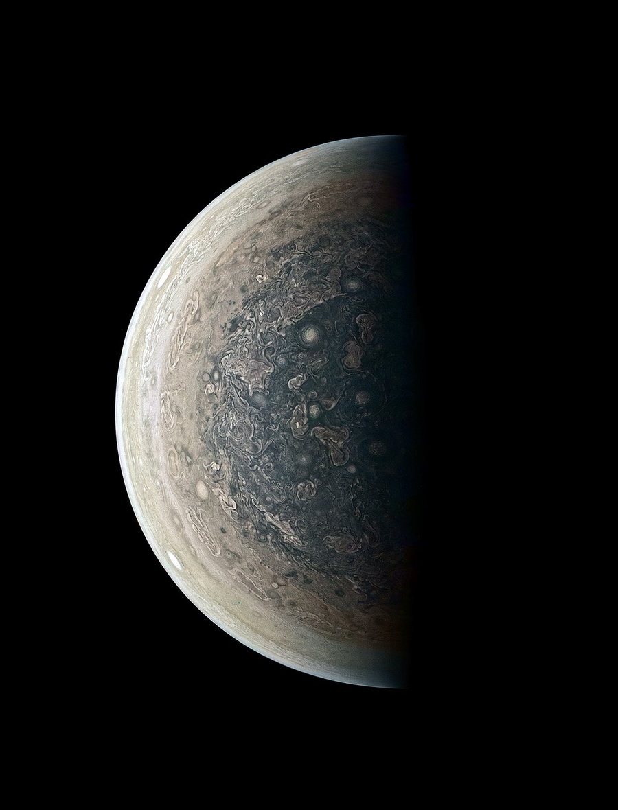 Color-enhanced image of the storms and cyclones at Jupiter’s South Pole by citizen scientist Roman Tkachenko.