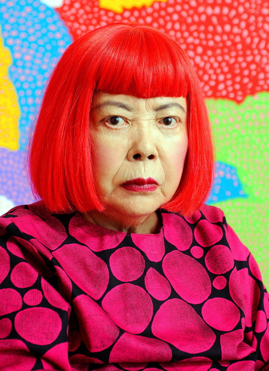 Artist Yayoi Kasuma surrounded by her signature surreal polka dots.