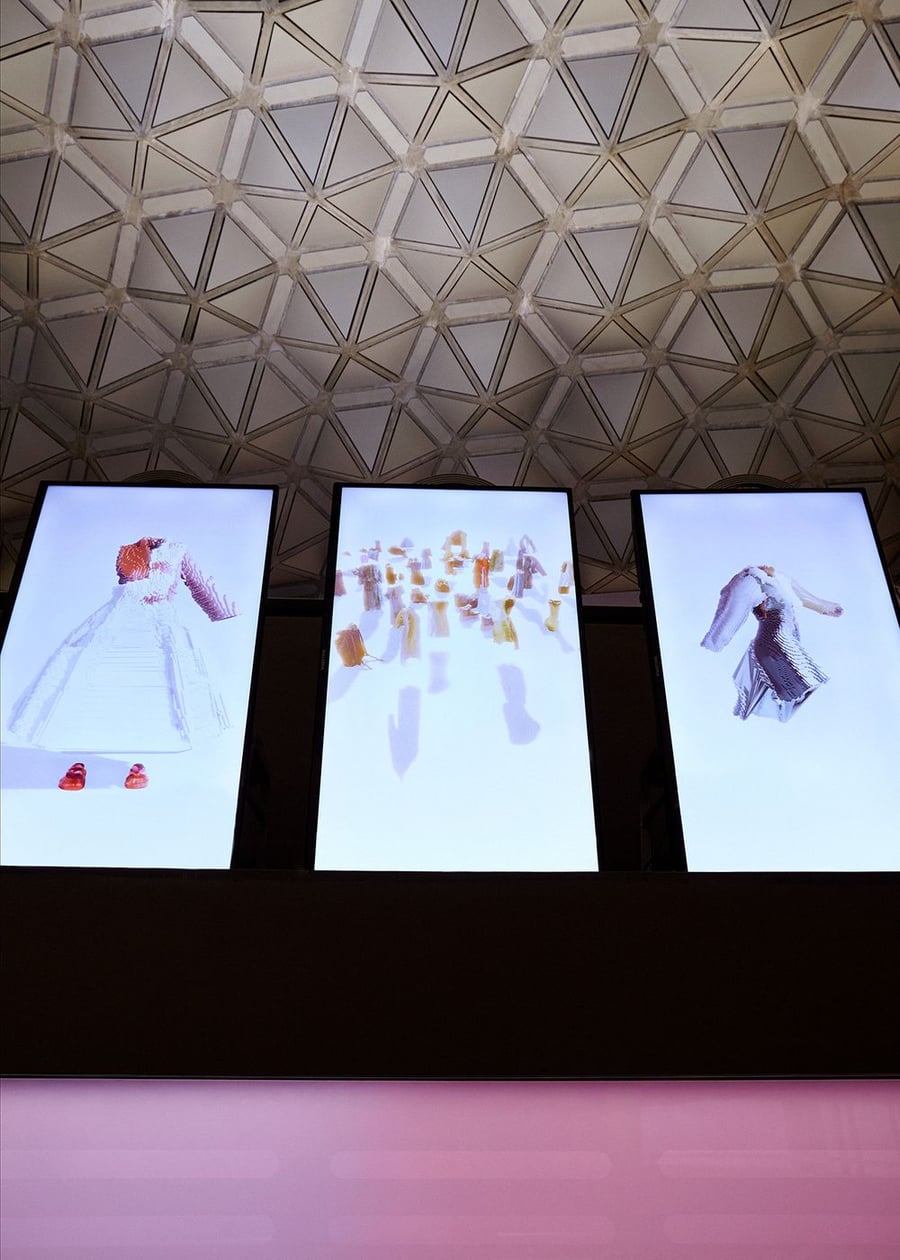 All the outfits in Kupča's Decrypted Garments collection appeared on large screens like these at the Salone de Mobile.