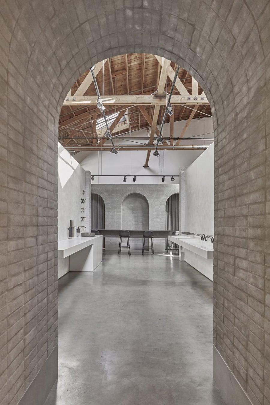 The Splash Lab's new Culver City Showroom  makes extensive use of arches and marble for a distinctly church-like feel. 