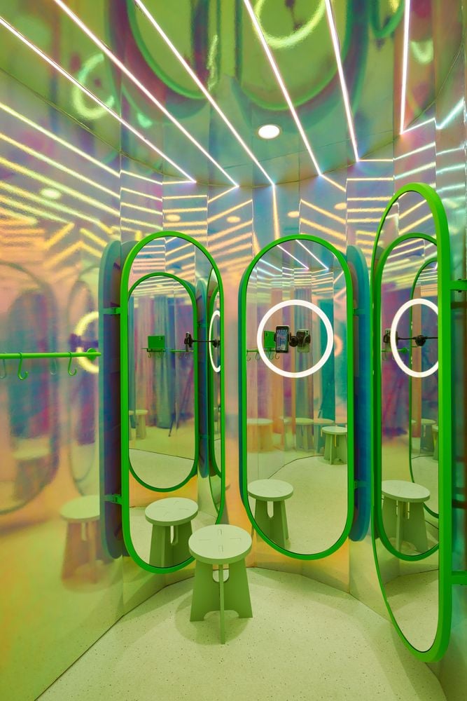 Surreal fitting room in the Masquespacio-designed Mango Teen store incorporates interactive metaverse features.