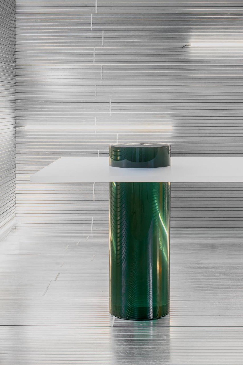 Close-up of the emerald green column that makes up one of the Cicero table's legs. 