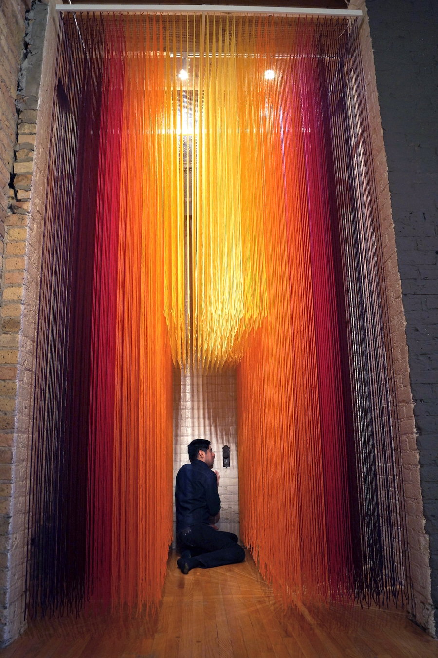 Colorful, interactive yarn art installation by HOTTEA.