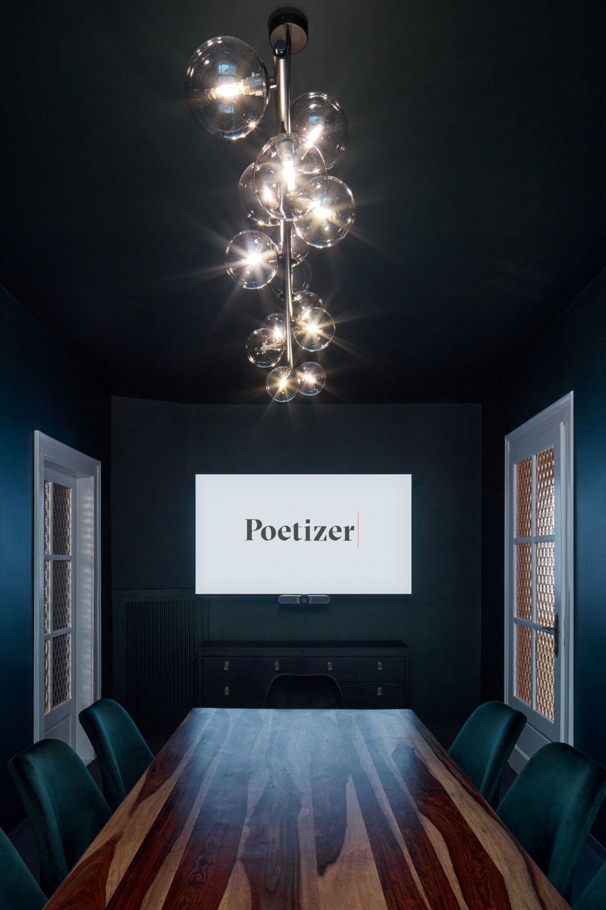 Large, dark conference room in the Tomas Cisar-designed Poetizer offices in Prague.