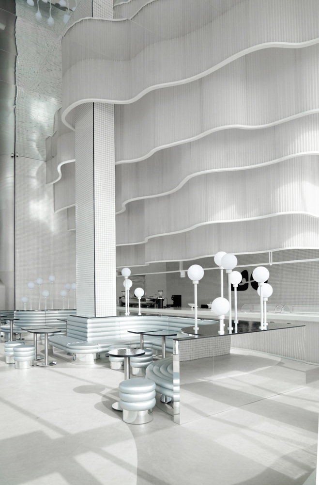 Undulating wave bar installation inside Saudi Arabia's retrofuturistic MO Bakery.