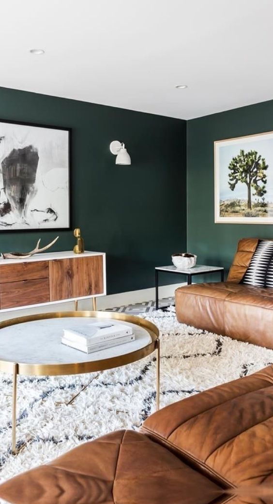 Living space with serene dark green walls.
