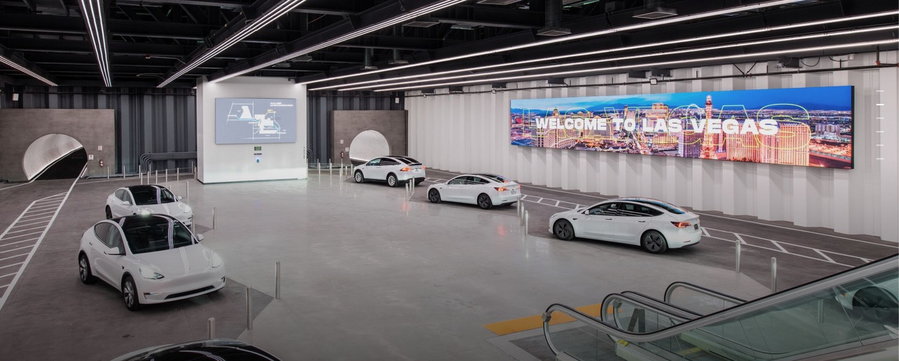 Driverless Tesla vehicles docked at the Boring Company's Las Vegas Convention Center Loop, opened in April 2021.