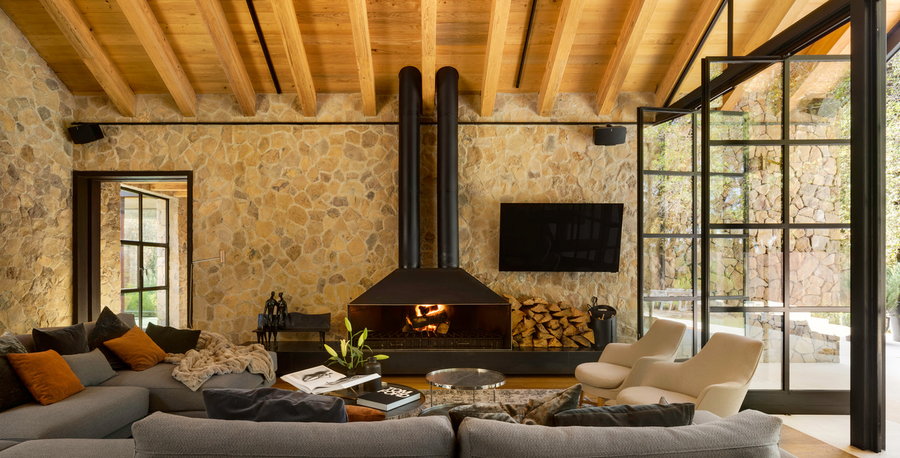 Cozy fireplace lounge area inside the Casa Rancha Avándaro.