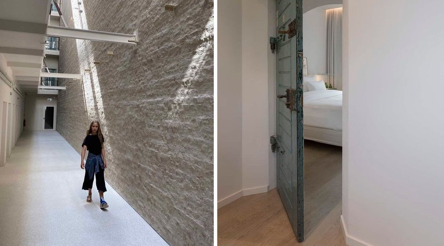 Young girl walks down a hallway in the Wilmina Hotel, towards a guest room that used to be a prison cell. 