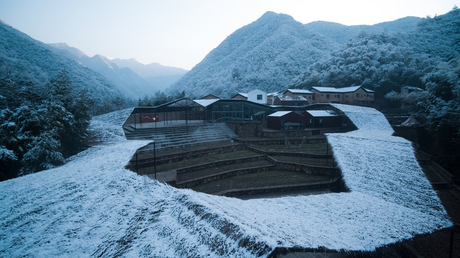 View of the Sou Fujimoto-designed Flowing Cloud pavilion while snow is falling.