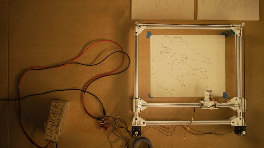 Overhead view of the robotic arm MSCHF used to seamlessly duplicate Andy Warhol's 
