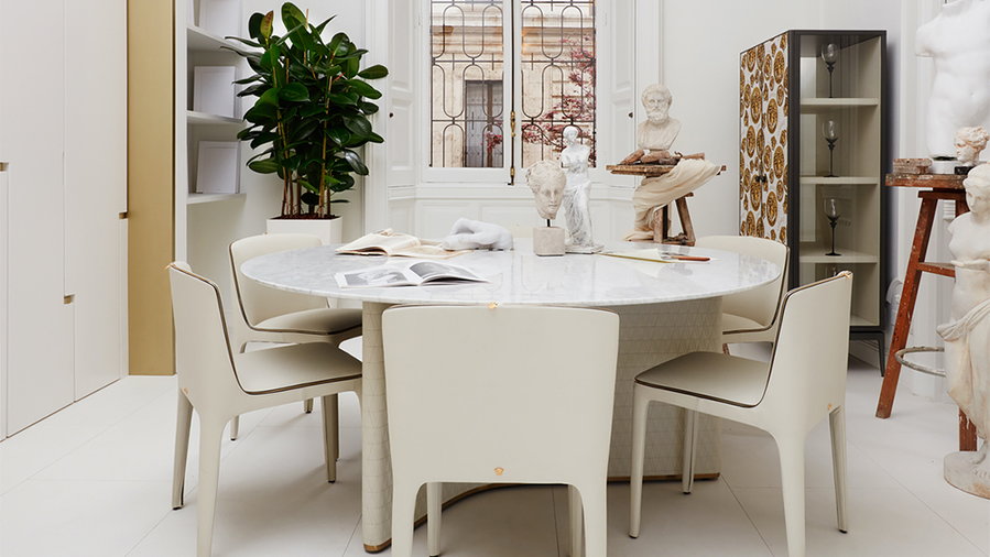 Modern dining set in Versace's flagship Home Store in Milan.