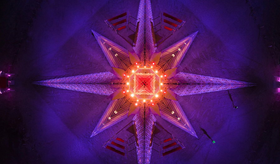 Nighttime aerial shot of the Empyrean Temple installation featured at Burning Man 2022.