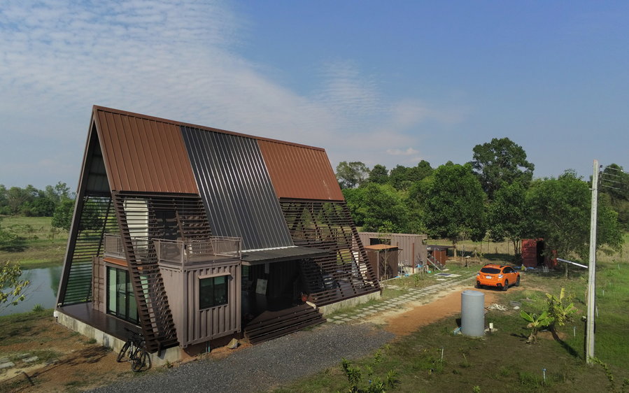 Shipping container cabin in rural Thailand designed by architect Tung Jai Ork Baab. 